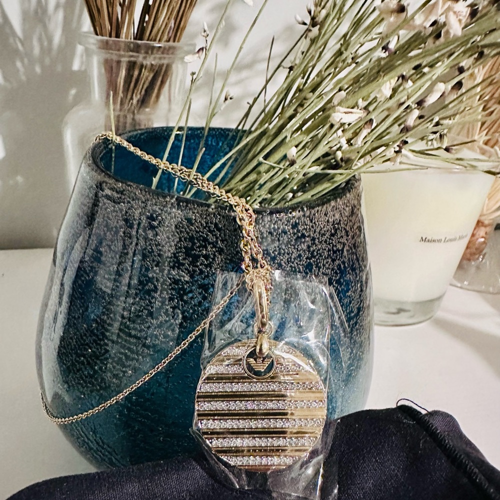 Emporio Armani necklace.  Never worn, original packaging still on the item.